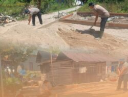Gerimis Tak Surutkan Langkah Brimob Polda Sumut Bangun Hunian Warga Yang Terdampak Banjir di Tapsel
